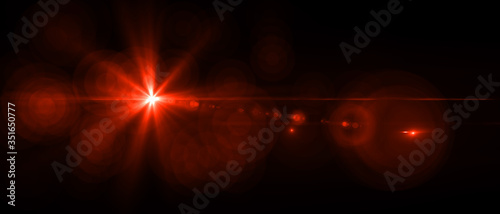 Lens flare red light over black background. Easy to add overlay or screen filter over your photos