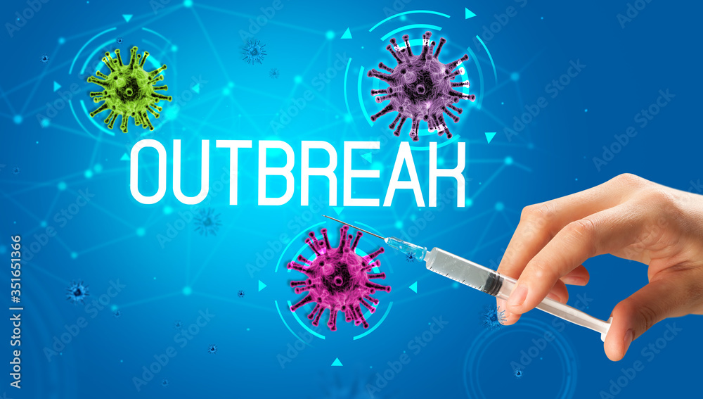 Syringe, medical injection in hand with OUTBREAK inscription, coronavirus vaccine concept Syringe, medical injection in hand with OUTBREAK inscription, coronavirus vaccine concept