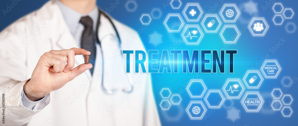 Close-up of a doctor giving you a pill with TREATMENT inscription, medical concept Close-up of a doctor giving you a pill with TREATMENT inscription, medical concept