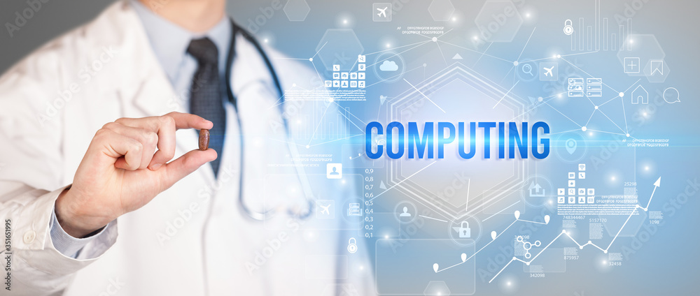 Doctor giving a pill with COMPUTING inscription, new technology solution concept Doctor giving a pill with COMPUTING inscription, new technology solution concept