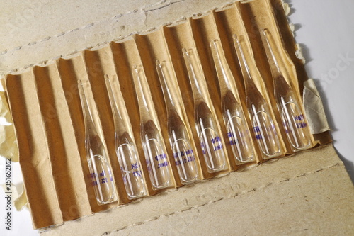 transparent glass ampoules with medicine in package