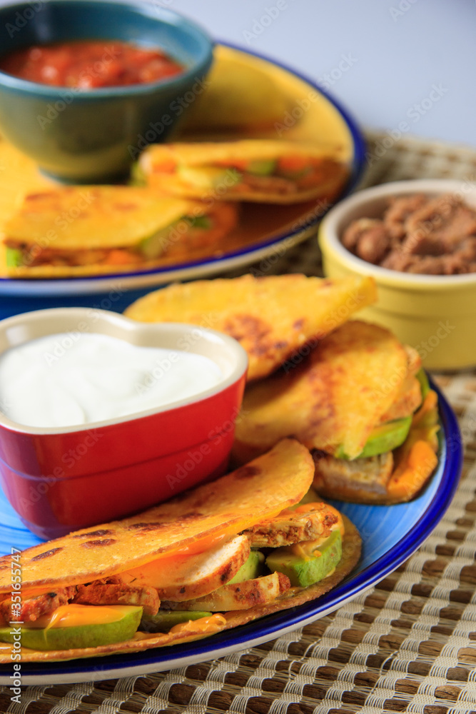 Home cooked quesadillas - quick and easy to prepare at home, colourful and comforting food, family tradition. 