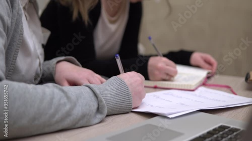 Woman students education studying at home, writing, school exam, documents work photo