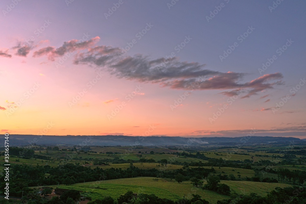 Aerial view of dramatic sky in the ranch. Rural life scene. Countryside landscape. 