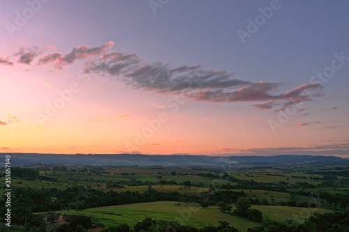 Aerial view of dramatic sky in the ranch. Rural life scene. Countryside landscape. 