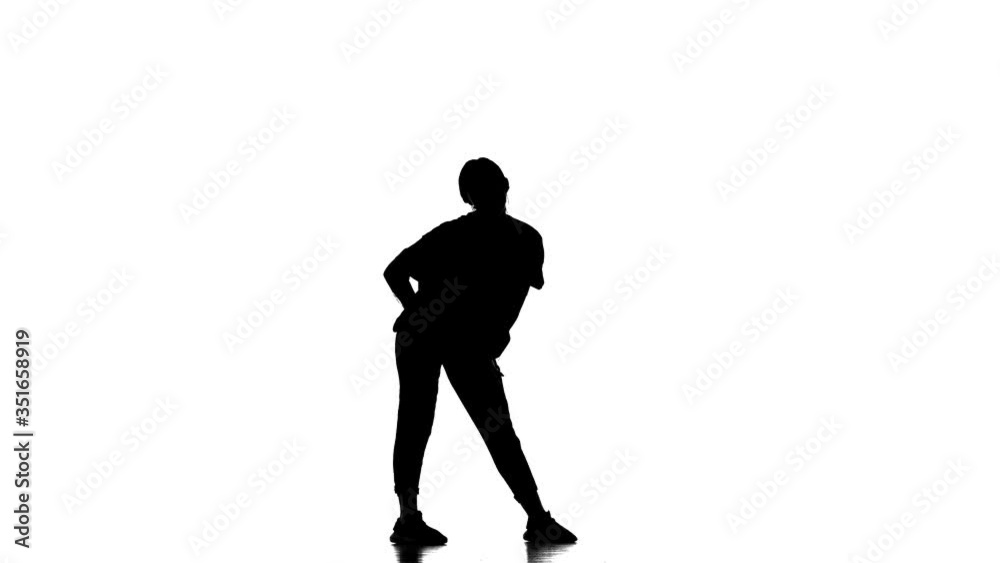 black silhouette on a white background, young beautiful girl dancer dancing hip hop, contemporary, modern street dance, slow motion black silhouette on a white background, young beautiful girl dancer dancing hip hop, contemporary, modern street dance, slow motion