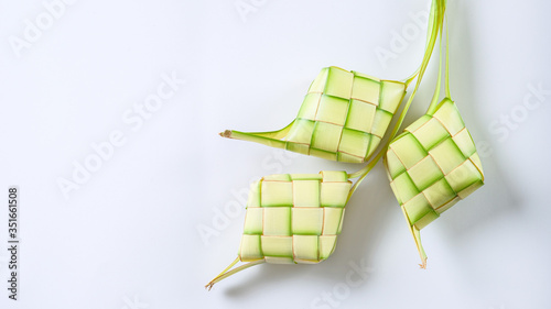 Top view of Ketupat isolated on white background. typical dish made from rice wrapped in wrappers made from plaited young coconut leaves.