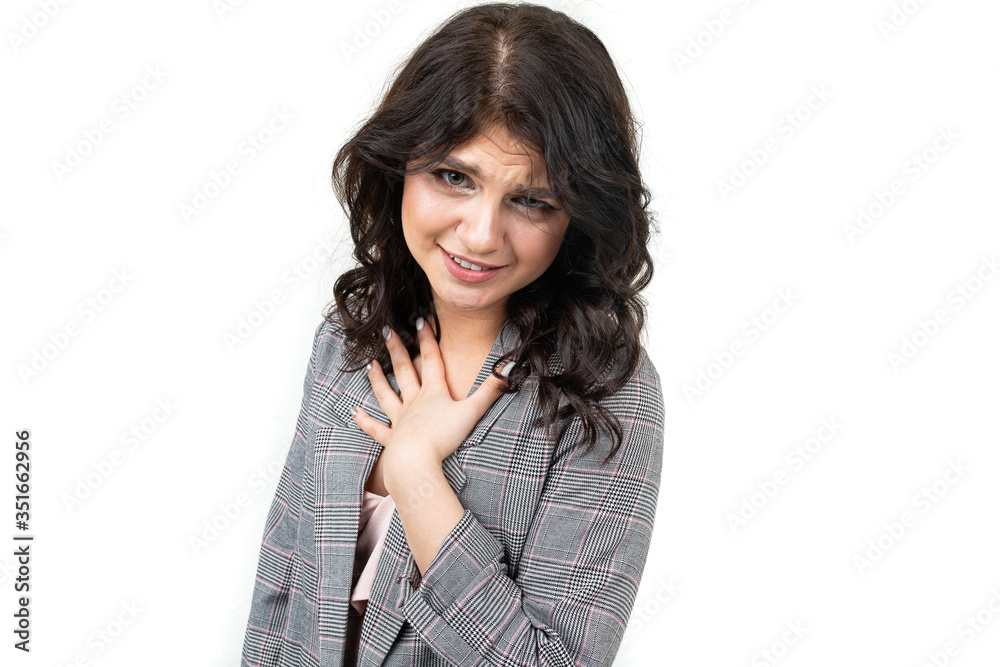 girl in a classic checkered gray jacket feels uncomfortable on a white background girl in a classic checkered gray jacket feels uncomfortable on a white background