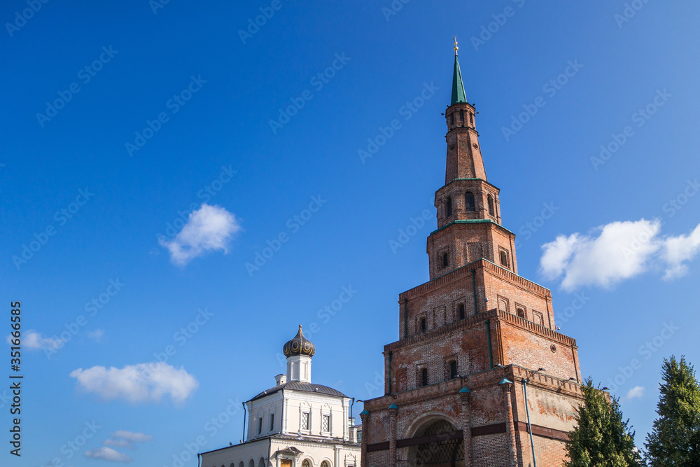 Leaning tower of Soyembika, main recognizable symbol of Kazan, Tatarstan, Russia. This is most attractive object of Kazan Kremlin complex. Height of structure about 58m. Palace church is on left side
