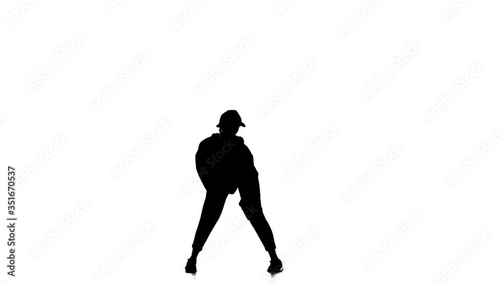 black silhouette on a white background, young beautiful woman dancer dancing hip hop, contemporary, modern street dance, slow motion black silhouette on a white background, young beautiful woman dancer dancing hip hop, contemporary, modern street dance, slow motion