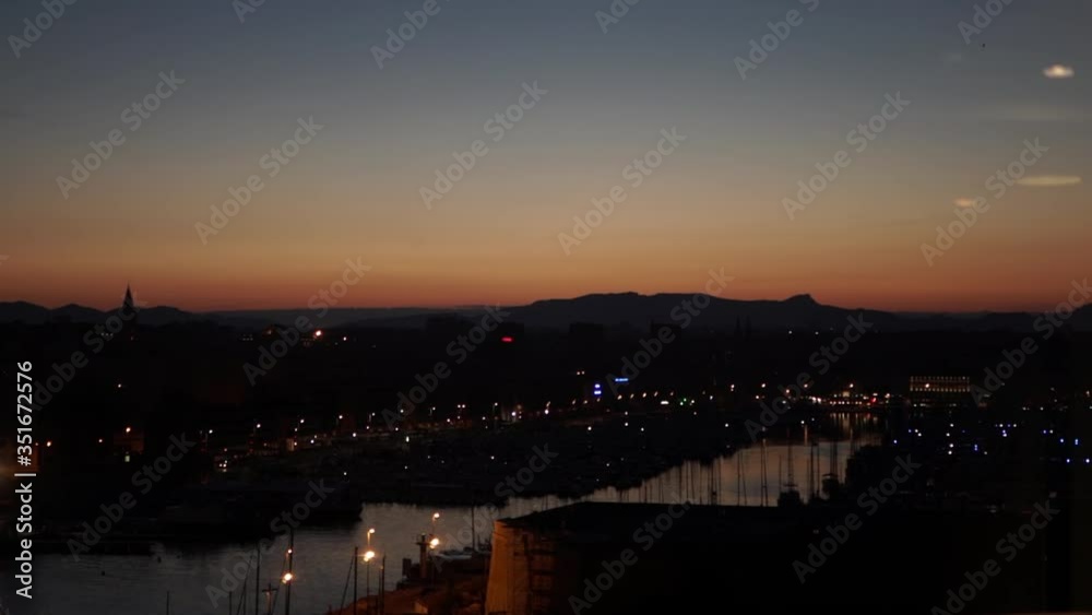 Aerial view of Marseilles at sunset with beautiful horizon (slow motion 120fps) Aerial view of Marseilles at sunset with beautiful horizon (slow motion 120fps)