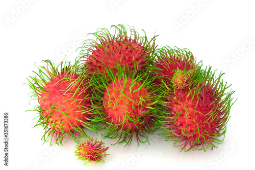 group of red and green rambutan fruit . Succulent white food sweet tasty. organic tropical fruits multi vitamin long hair. isolated on white background