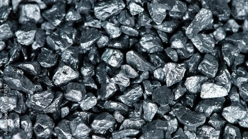 Heap of silver nuggets background (seamless loopable)