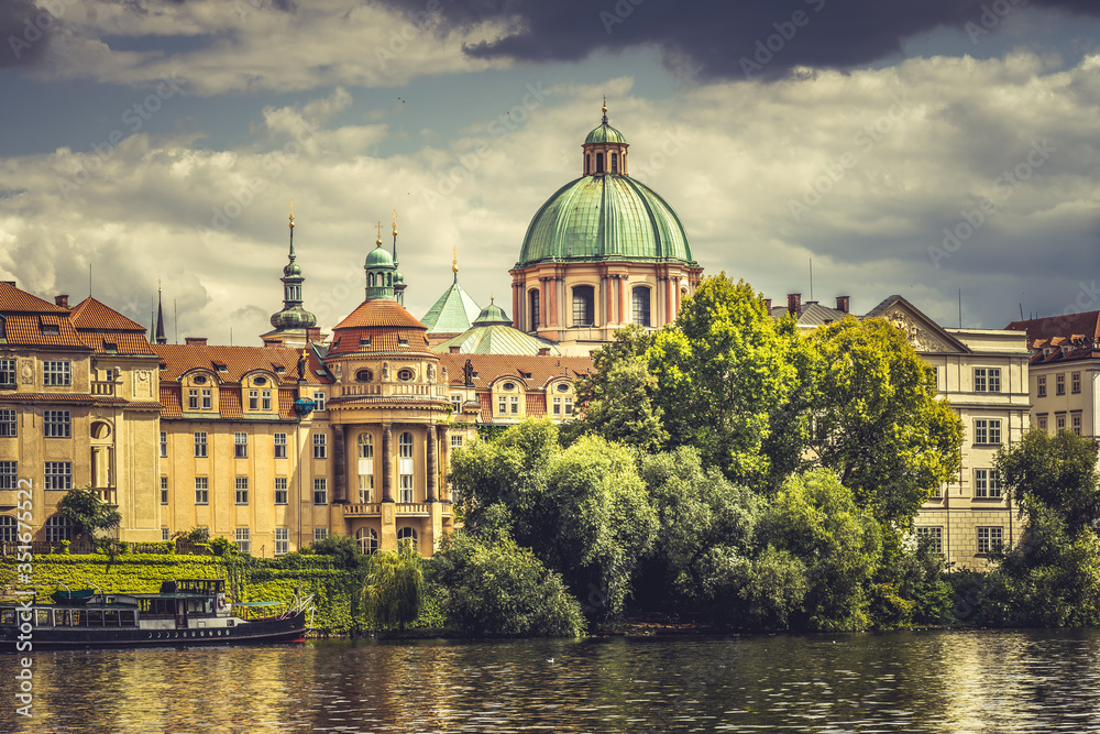 Scenic panorama cityscape view of Moldava river boat Prague in Czech Republic.