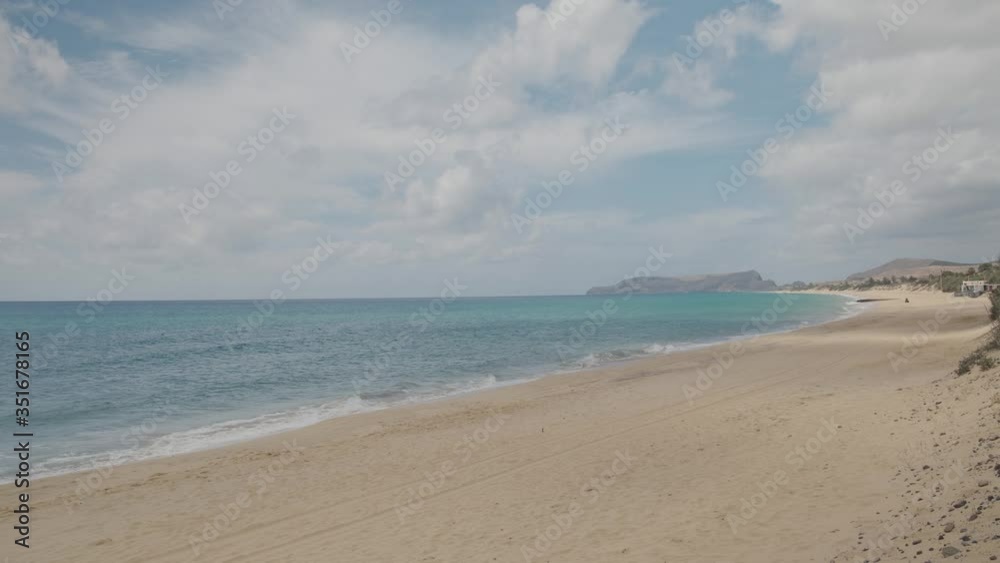 Peaceful scene deserted white sand beach Porto Santo Island, Still shot Peaceful scene deserted white sand beach Porto Santo Island, Still shot