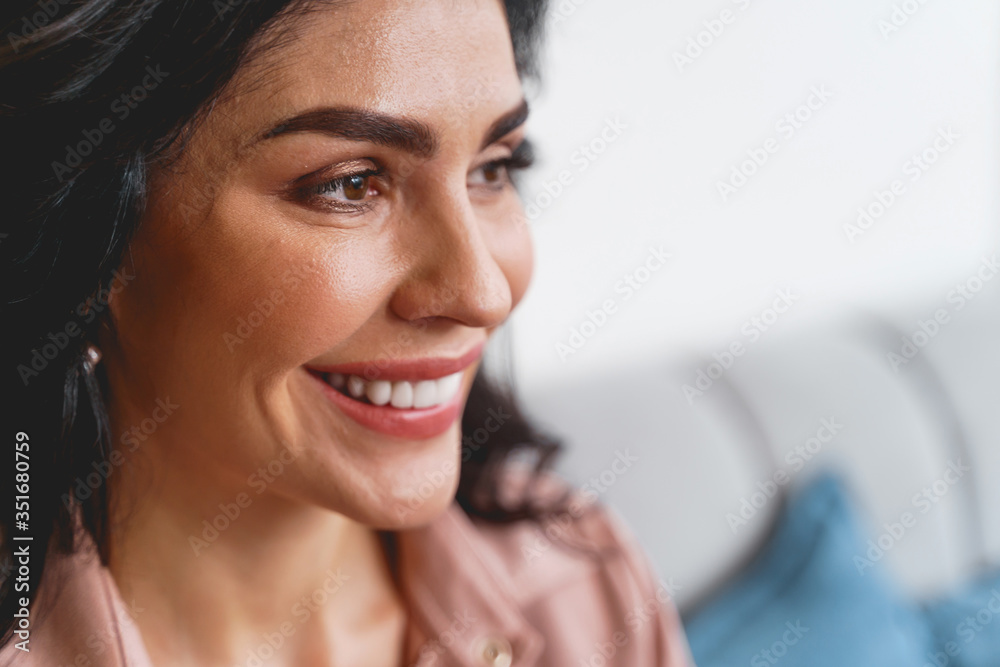 Attractive lady with charming smile expressing positive emotions Attractive lady with charming smile expressing positive emotions