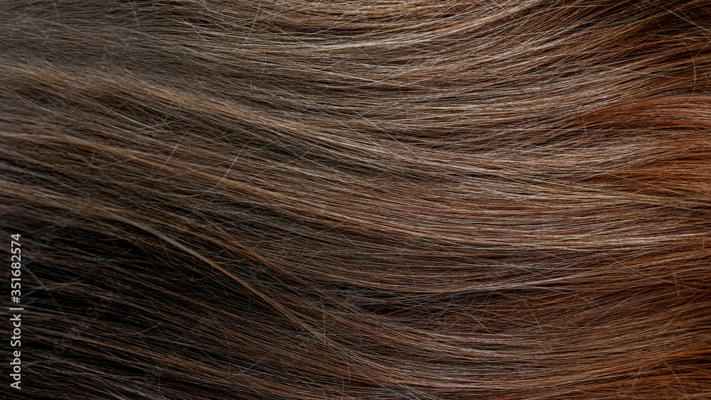 Fototapeta premium Beautiful wavy hair texture, brown hair, 16:9