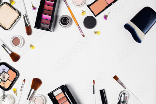 professional decorative cosmetics, makeup tools on white background.