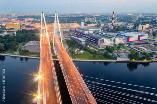 Cable-stayed bridge in Saint-Petersburg, Russia. Aerial industrial cityscape.