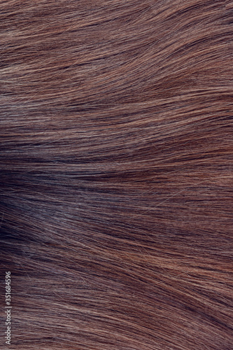 Beautiful wavy hair texture, brown hair, vertical