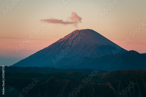 Semeru volcano on Java island, Indonesia. Foggy sunrise, another planet landscape