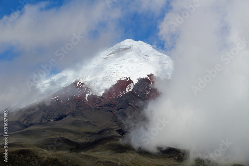 Volcano Cotopaxi between clouds in Ecuador © Denise