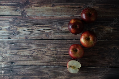 Apples on the wooden table copy space image