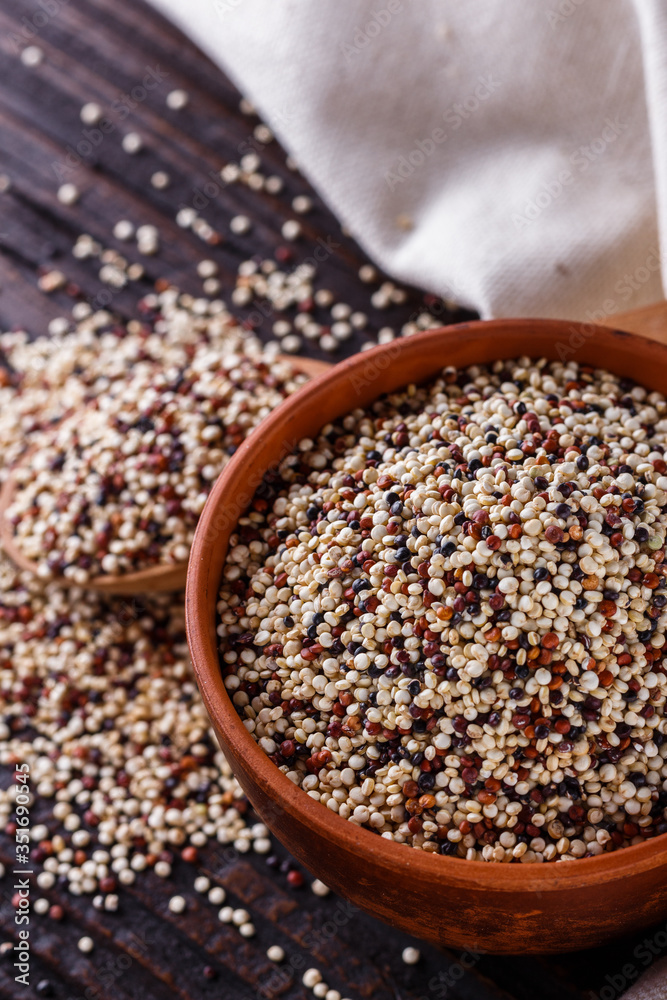 mix of quinoa grains on dark wooden rustic background mix of quinoa grains on dark wooden rustic background