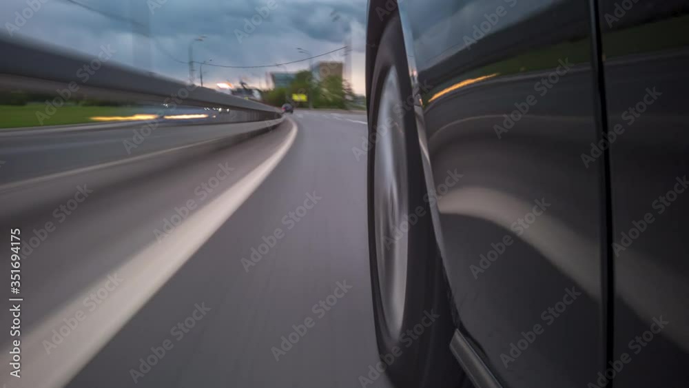 Car wheel spinning POV - Point of View, country side. Long exposure timelapse.