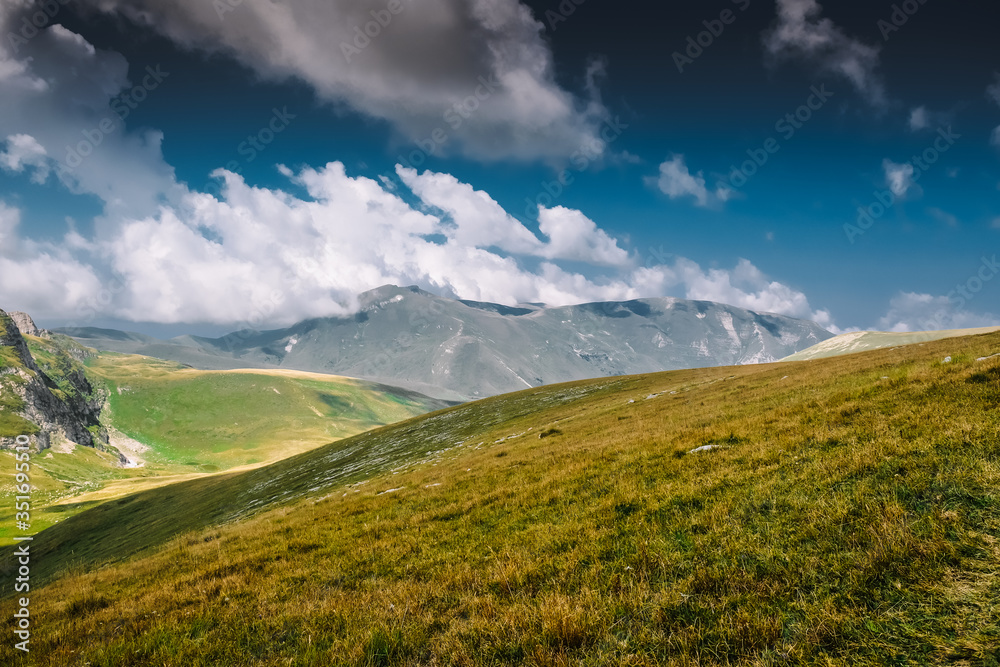 Mountain landscape alpine meadow at the end of summer, withered grass Monument of nature Unesco, Adygea, Oshten, favorable ecology. The famous tourist route.