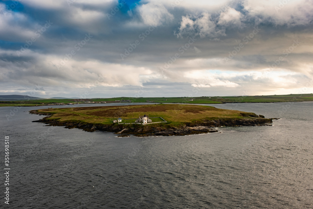 View of Orkney islands coastline from cruise ship - Sea, Beach and The castle on morning, Kirkwall, Scotland, UK View of Orkney islands coastline from cruise ship - Sea, Beach and The castle on morning, Kirkwall, Scotland, UK