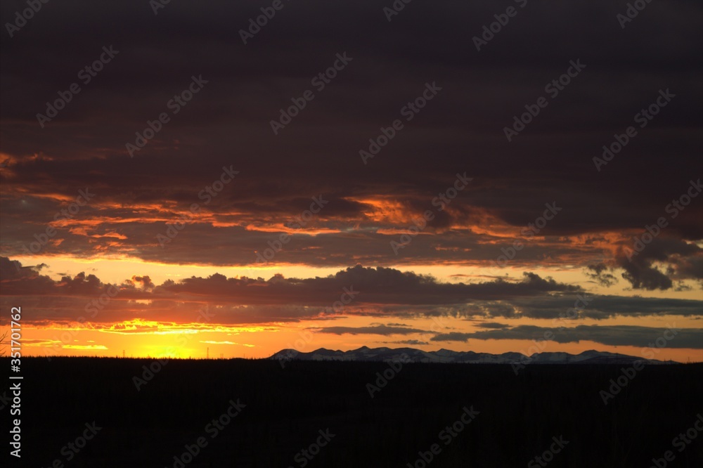 Orange sunset at the beginning of the Polar summer