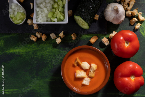 Fototapeta Naklejka Na Ścianę i Meble -  gazpacho vegan and vegetarian Extremaduran dish with tomato, cucumber, onion, garlic and bread croutons