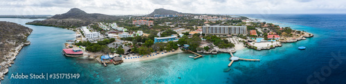 Fototapeta Naklejka Na Ścianę i Meble -  Aerial view of coast of Curacao in the Caribbean Sea with turquoise water, cliff, beach and beautiful coral reef 
