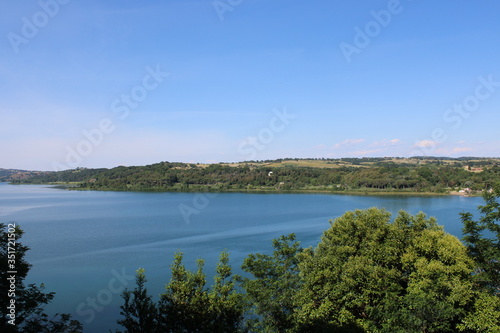 Wallpaper Mural aerial view of a beautiful lake with tree and moutains near lake bracciano rome italy  Torontodigital.ca