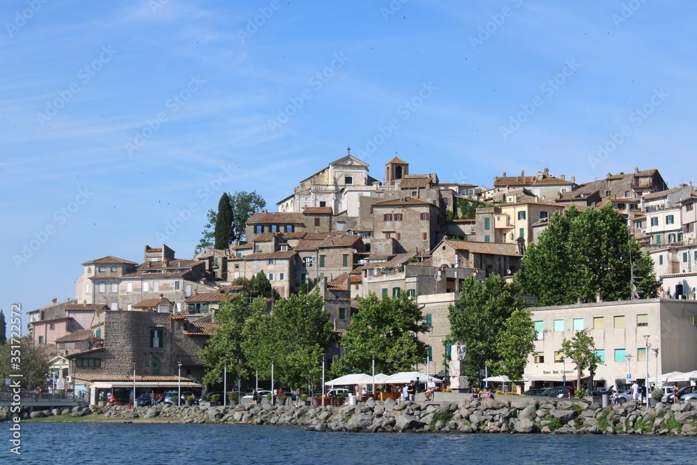 view of the old town on hight namely Anguillara Sabazia near rome italy Anguillara Sabazia is a town on the lake bracciano