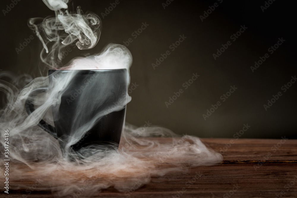 smoke in a black cup on a black background