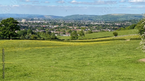 Lower slopes of Leckhampton Hills looking over Cheltenham towards winchcombe and Cleeve Hills photo