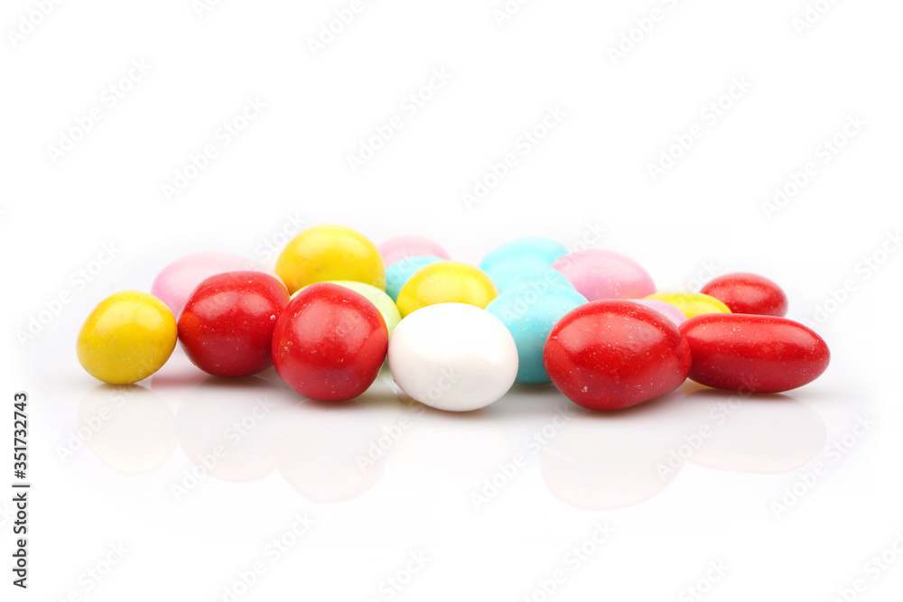 Colorful Almond candies buttons isolated on white background Colorful Almond candies buttons isolated on white background