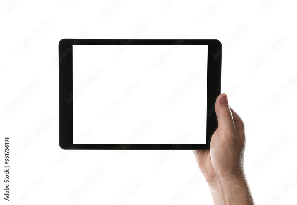 Man holding tablet computer with blank screen on white background, closeup. Modern gadget Man holding tablet computer with blank screen on white background, closeup. Modern gadget