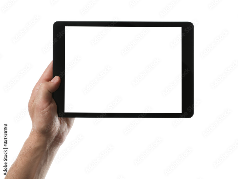 Man holding tablet computer with blank screen on white background, closeup. Modern gadget Man holding tablet computer with blank screen on white background, closeup. Modern gadget