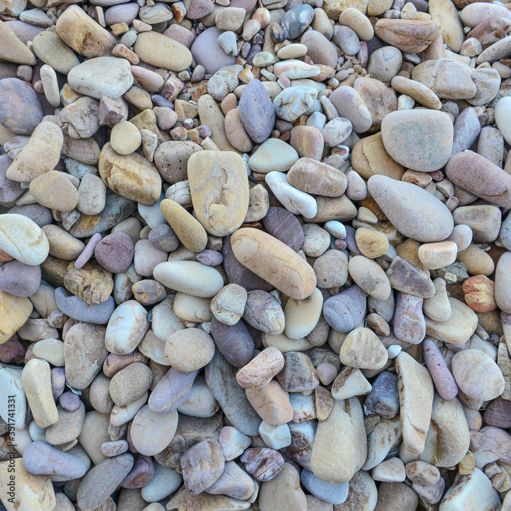 Close up of rounded and polished beach rocks