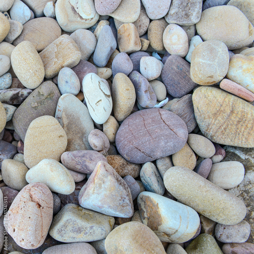 Close up of rounded and polished beach rocks Close up of rounded and polished beach rocks