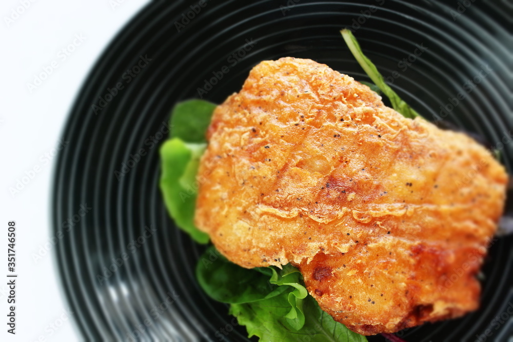 Fried chicken on white dish with copy space Fried chicken on white dish with copy space