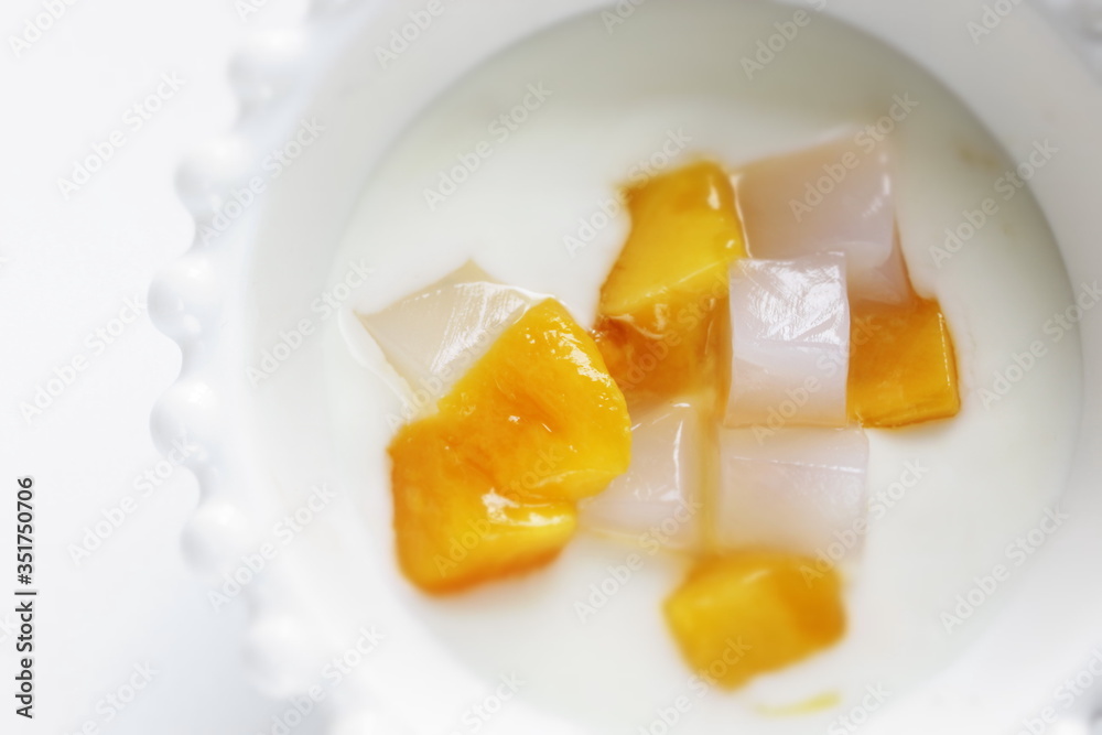Mango and nada de coco in yogurt for healthy dessert Mango and nada de coco in yogurt for healthy dessert