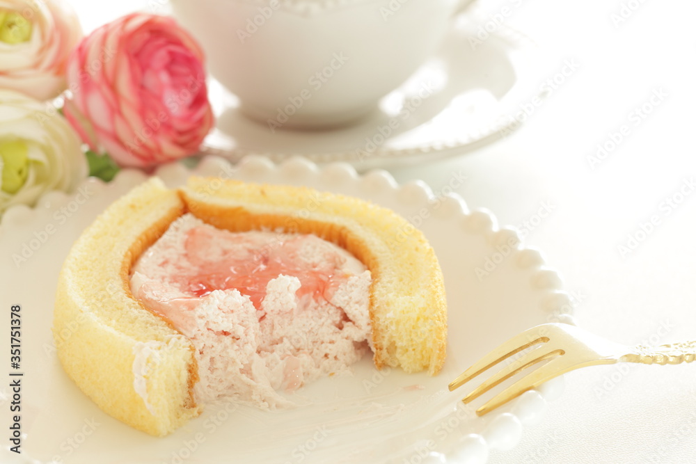 Strawberry jam Swiss roll and tea Strawberry jam Swiss roll and tea