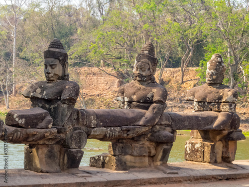 Statues of gods at the South Gate of Angkor Thom - Siem Reap  Cambodia