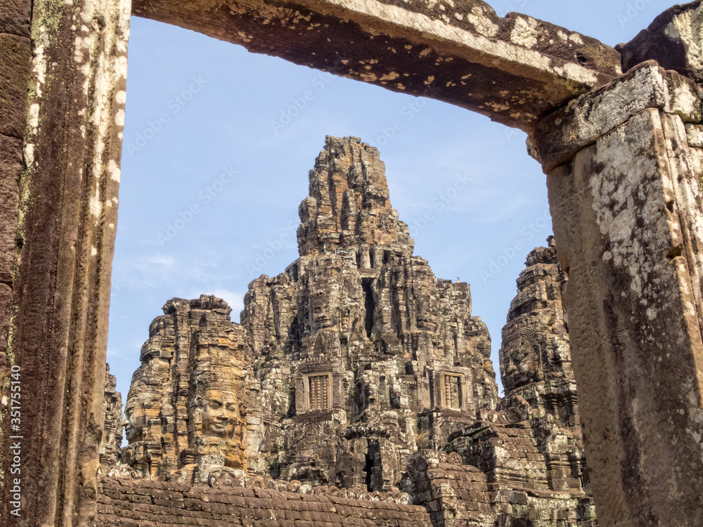 Face towers in a window frame at Angkor Thom - Siem Reap, Cambodia
