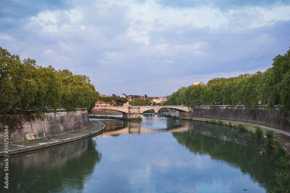 Rome city view with tiber river at dusk
