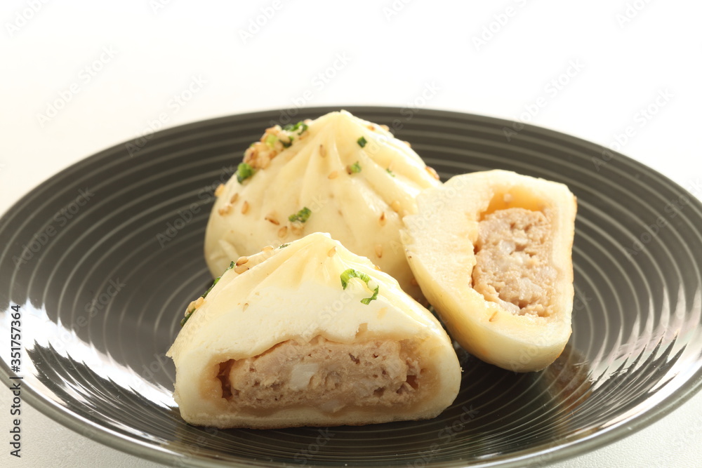 Chinese food, dumping Sheng Jian Bao pan fried meat bun Chinese food, dumping Sheng Jian Bao pan fried meat bun